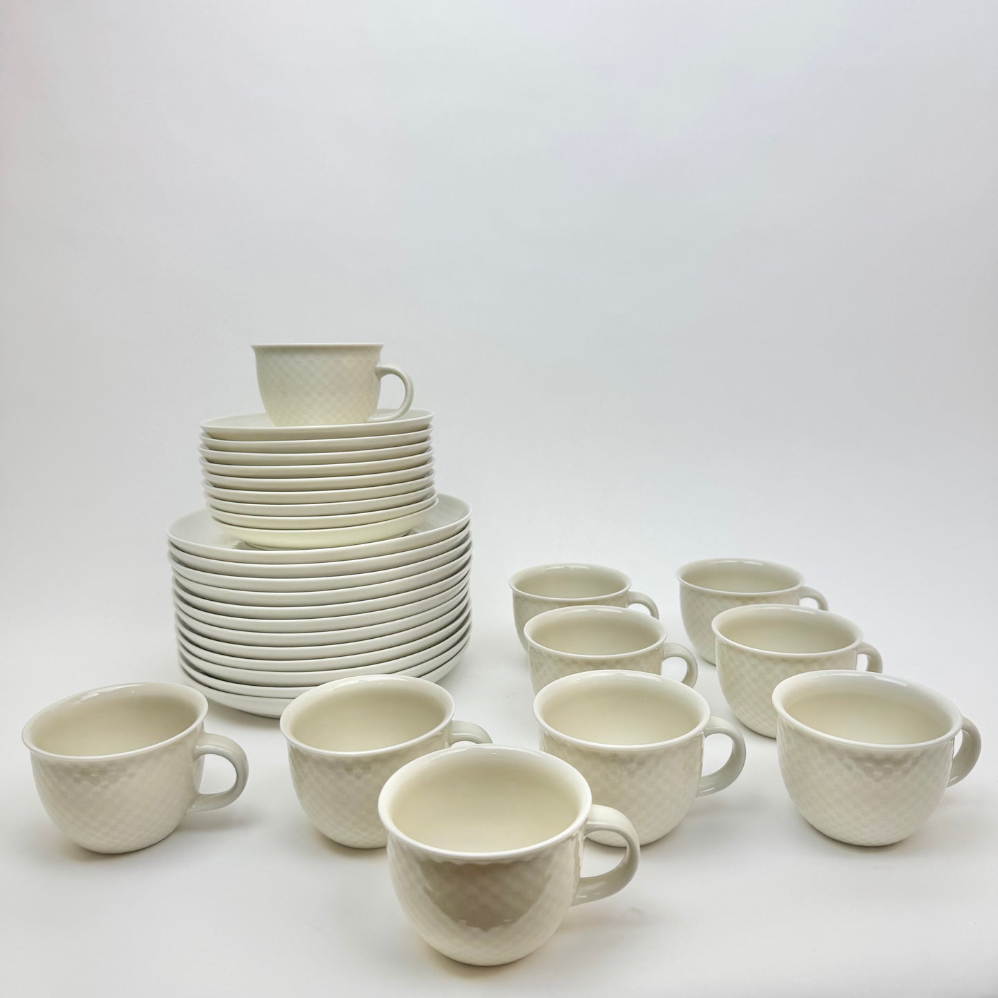 Set med 21 delar, kaffekoppar/assietter av Signe Persson Melin för Boda Nova