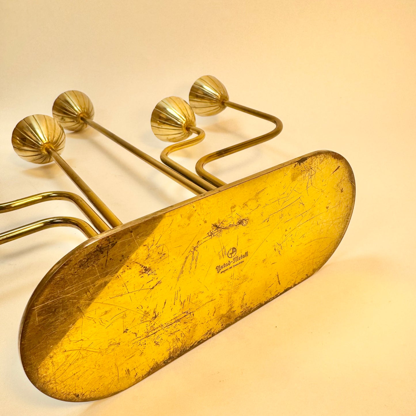 Kandelaber i mässing av Gunnar Ander för Ystad Metall