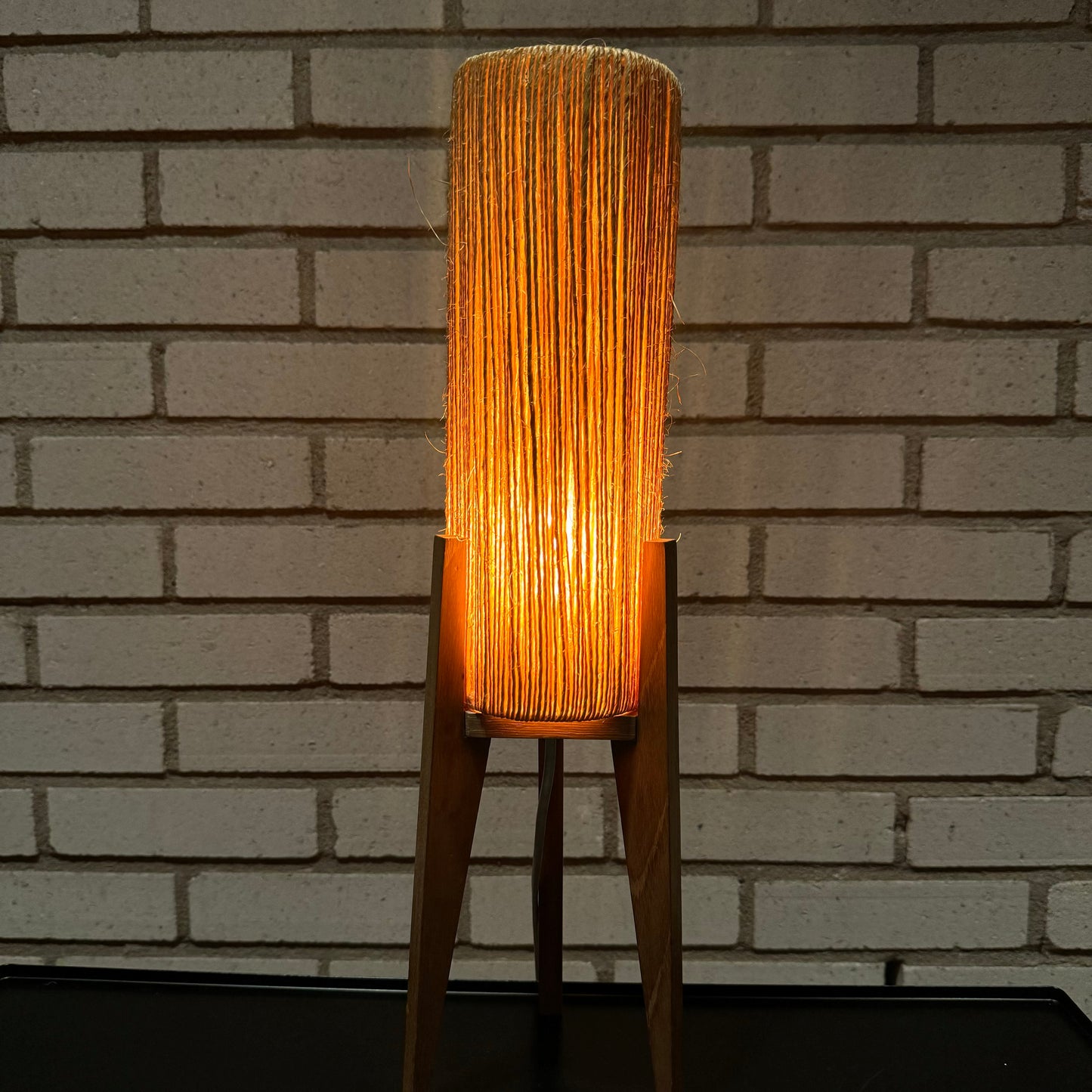 Table lamp with paper cord