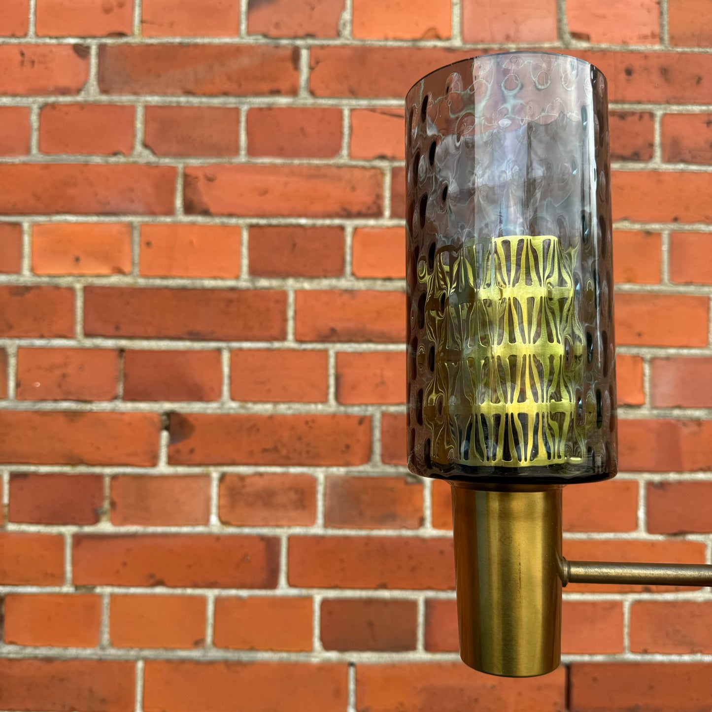 Wall lamp in bras and smoked glas