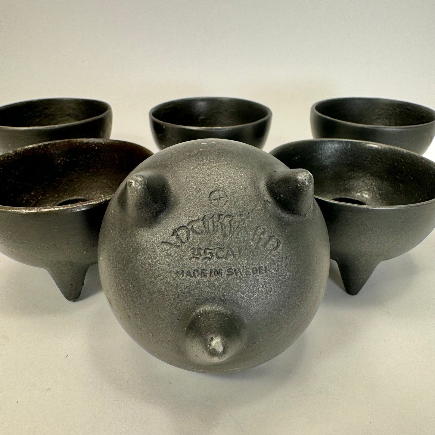 Candle holders in cast iron by Ystad Metall