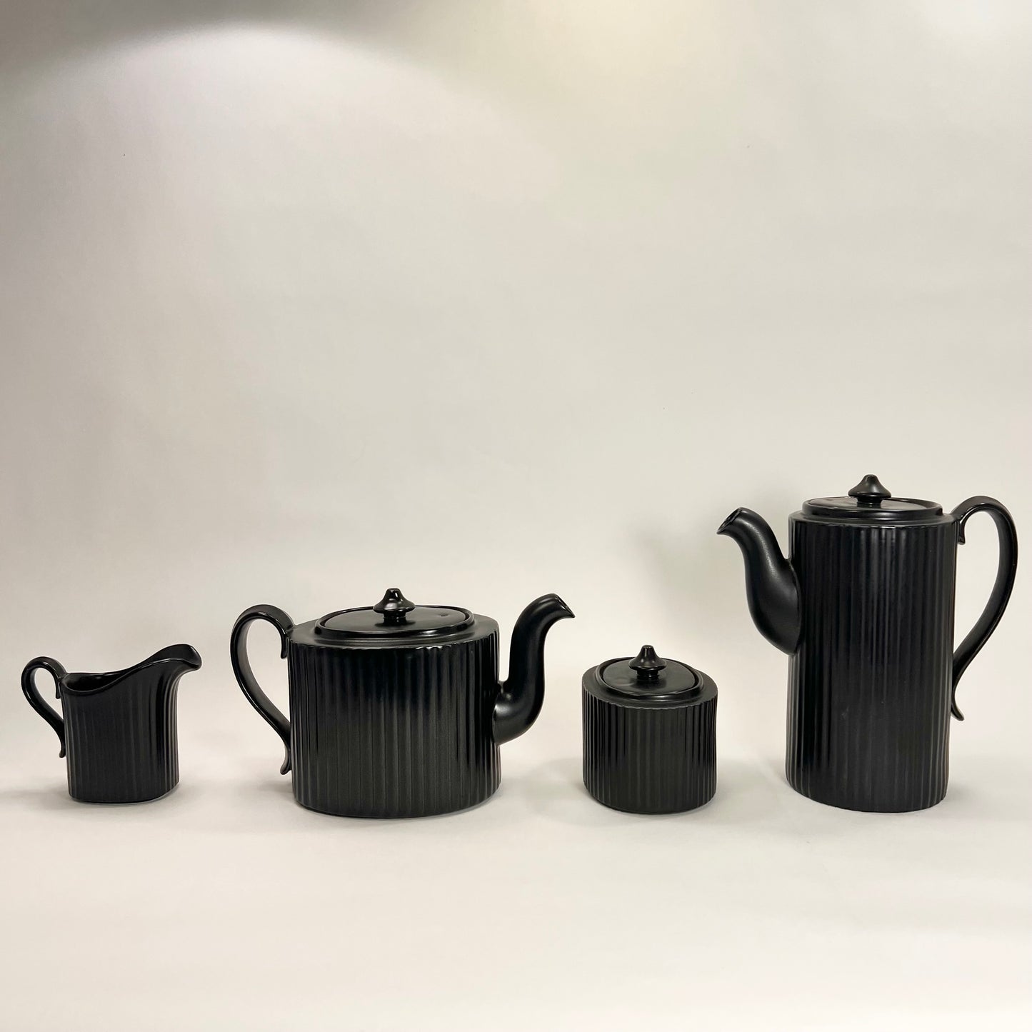Tea and coffee pottles by Arthy Percy