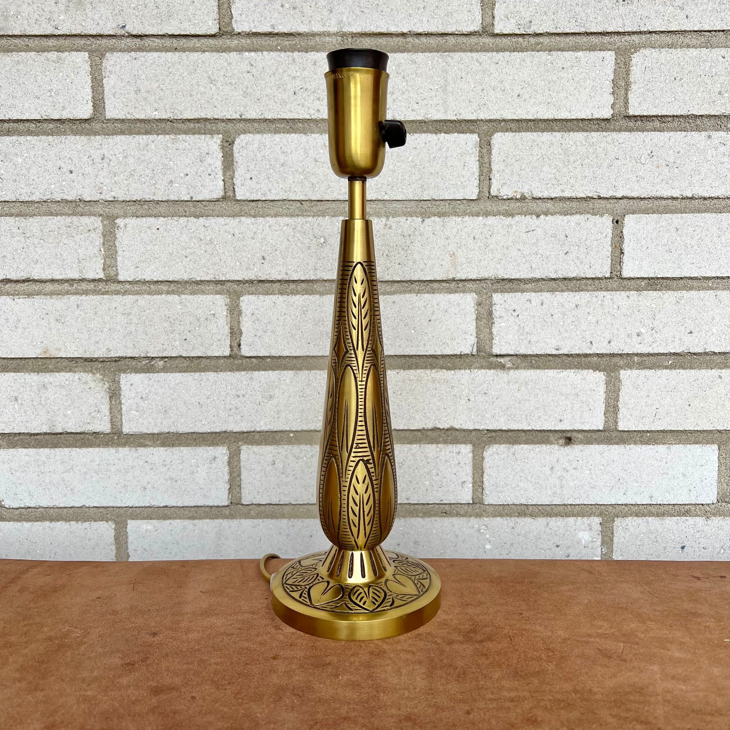Table lamp in bras by Einar Bäckström
