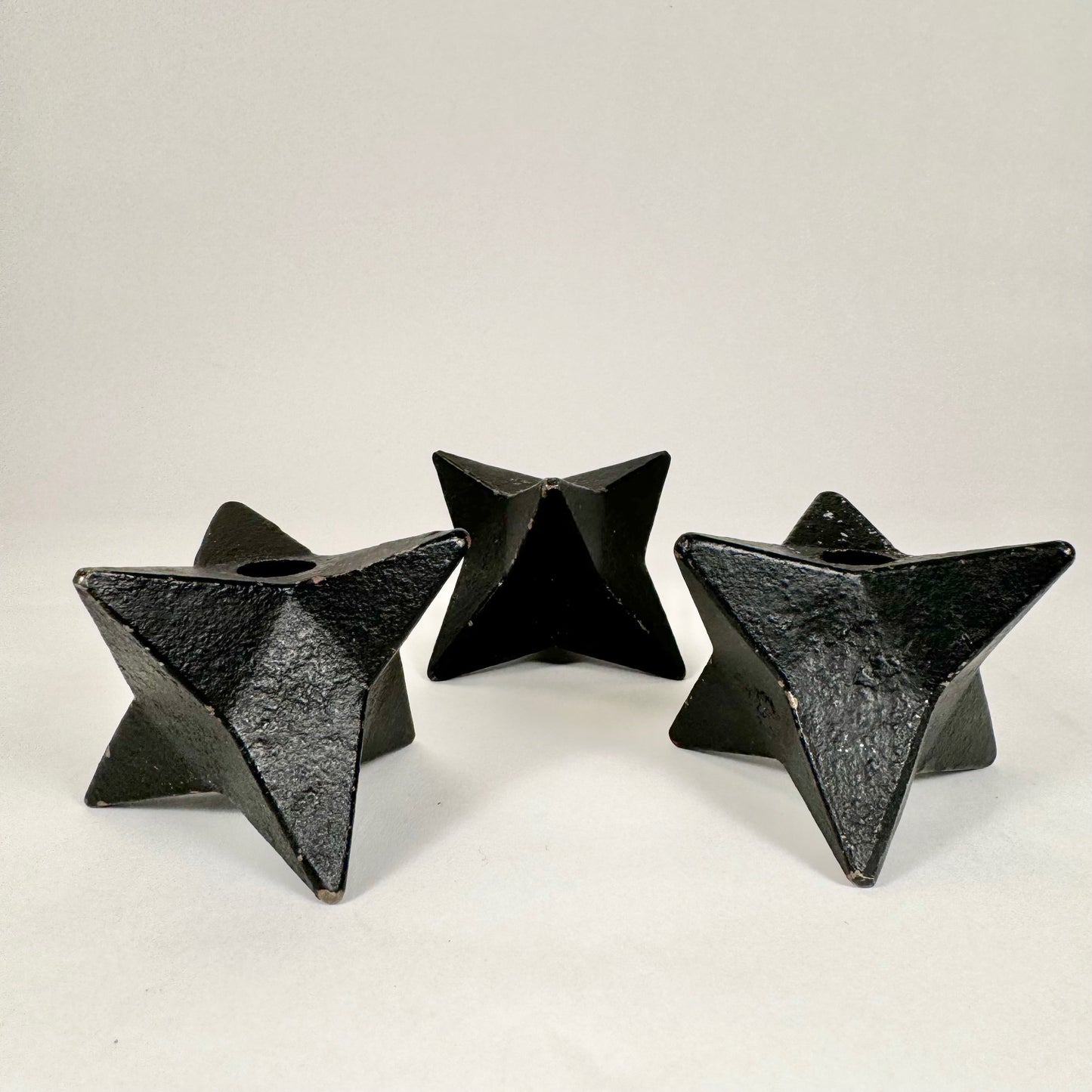 Candle holders in cast iron
