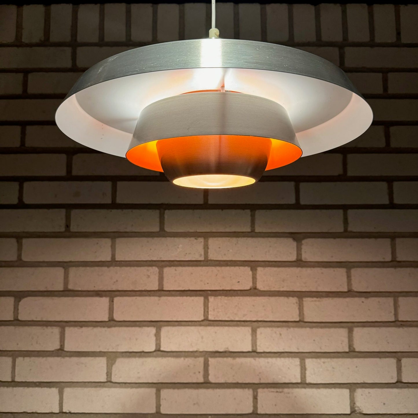 Pendant with orange details by Lyskaer