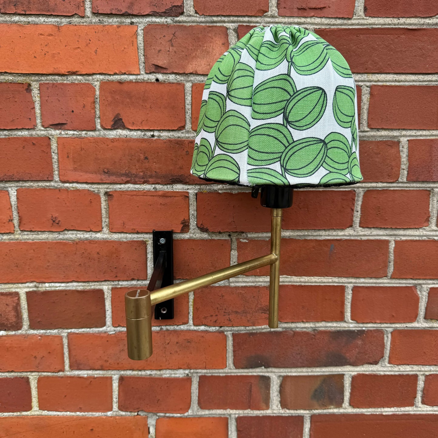 Wall lamp in brass and Josef Frank fabric