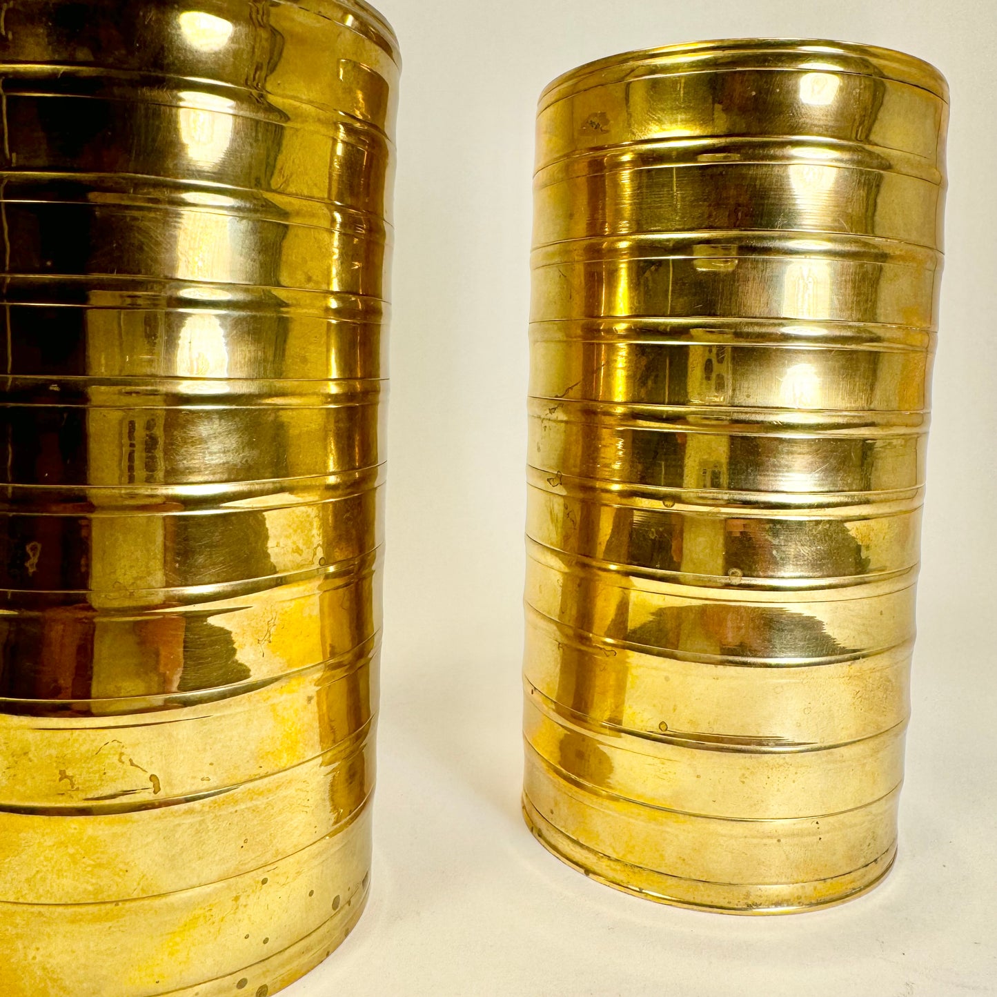 Pair of candle holders in brass