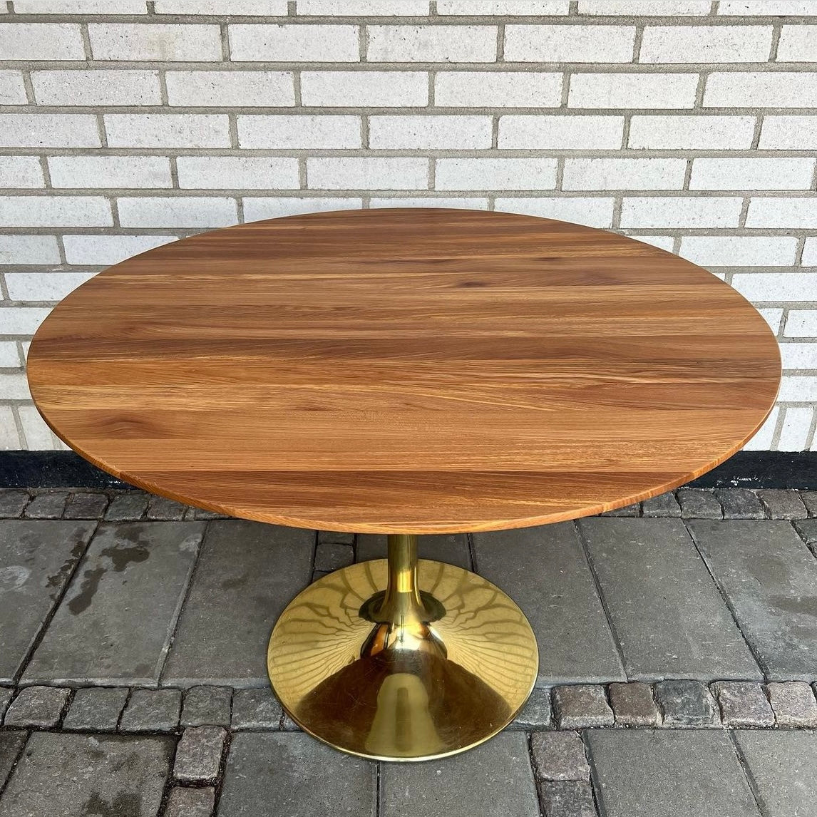 1970s dinner table with brass base