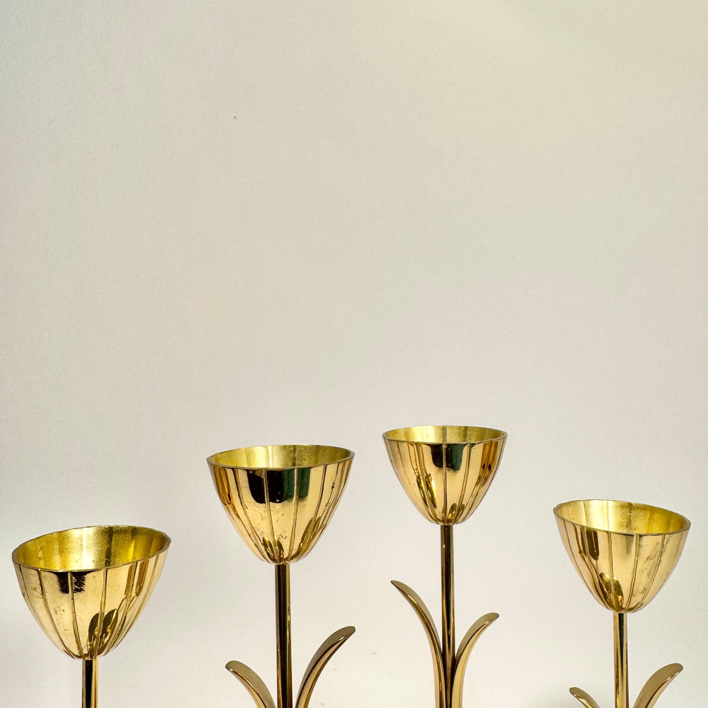 Ljusstakar i mässing av Gunnar Ander for Ystad Metall