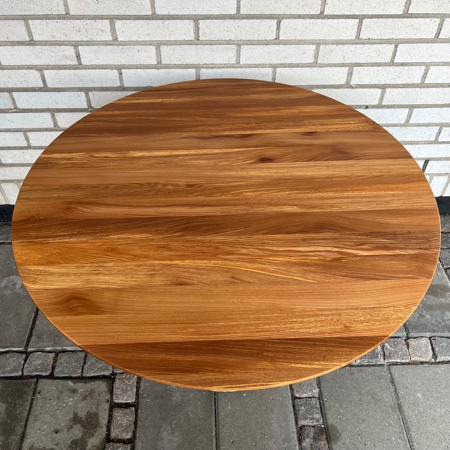 1970s dinner table with brass base