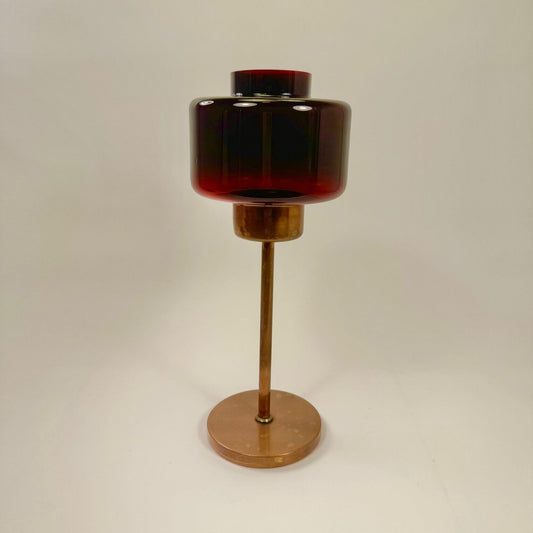 Candle holder with red glass