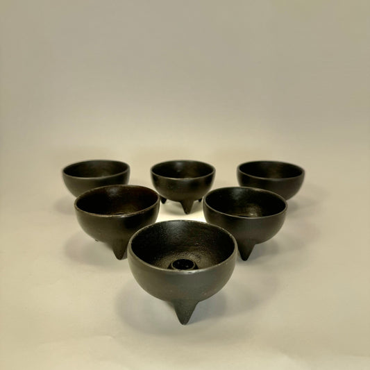Candle holders in cast iron by Ystad Metall