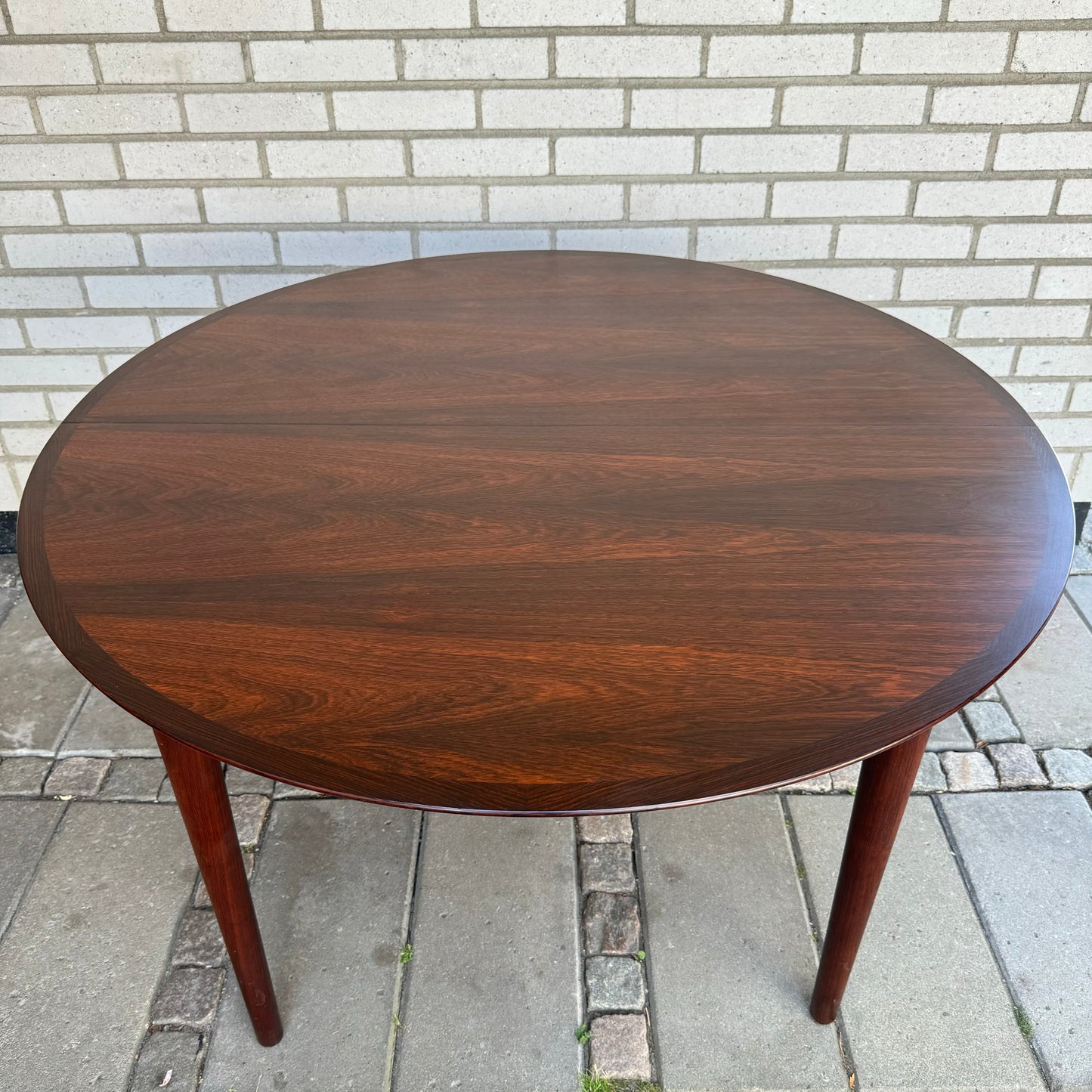 Dining table in Roosewood by Arne Vodder