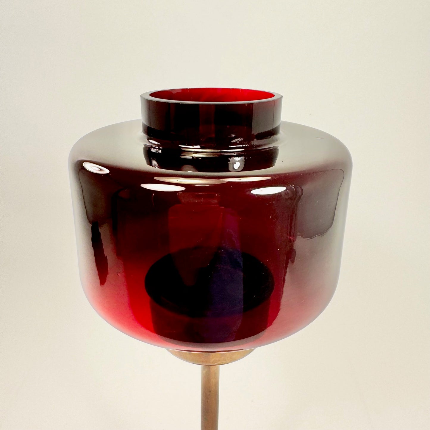 Candle holder with red glass