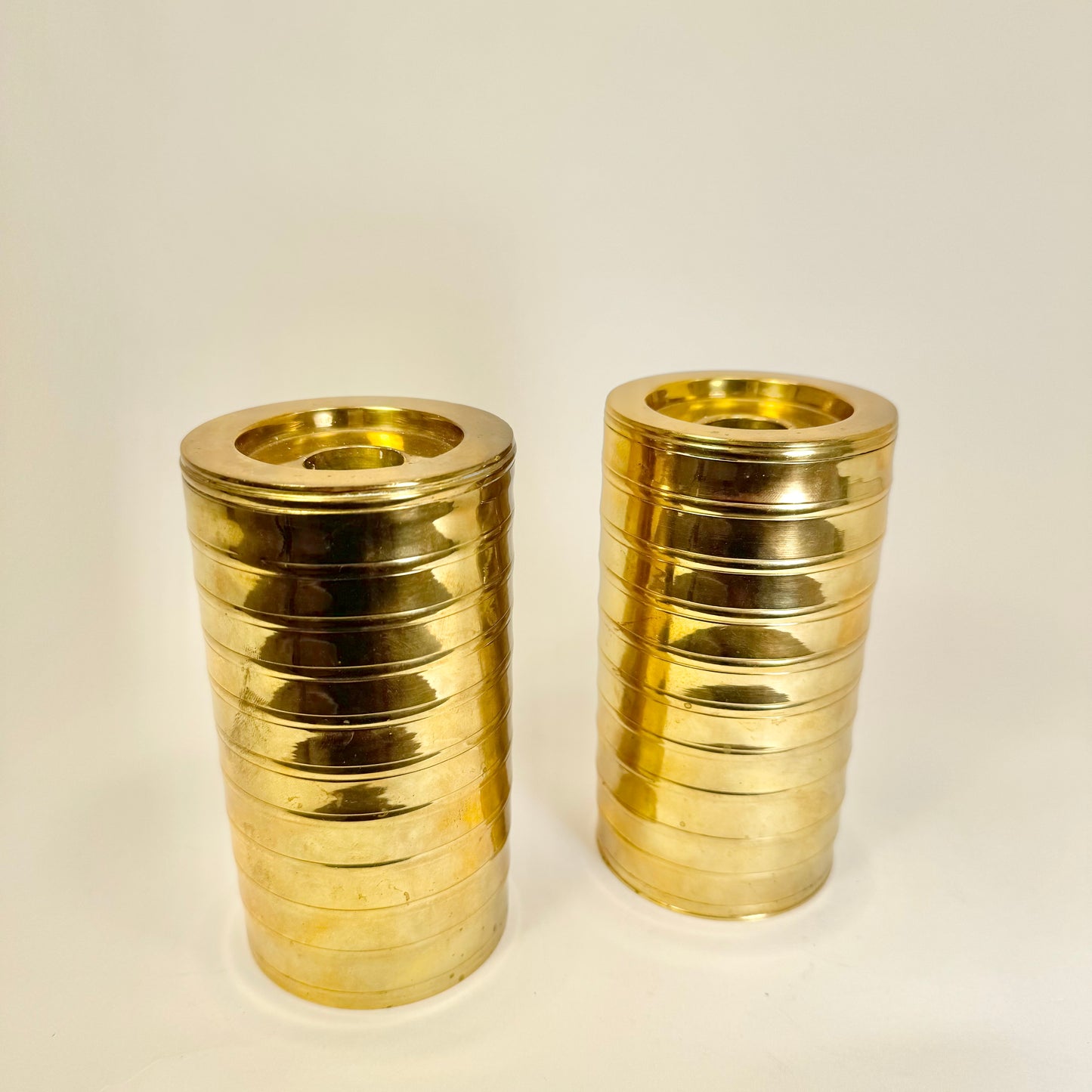 Pair of candle holders in brass