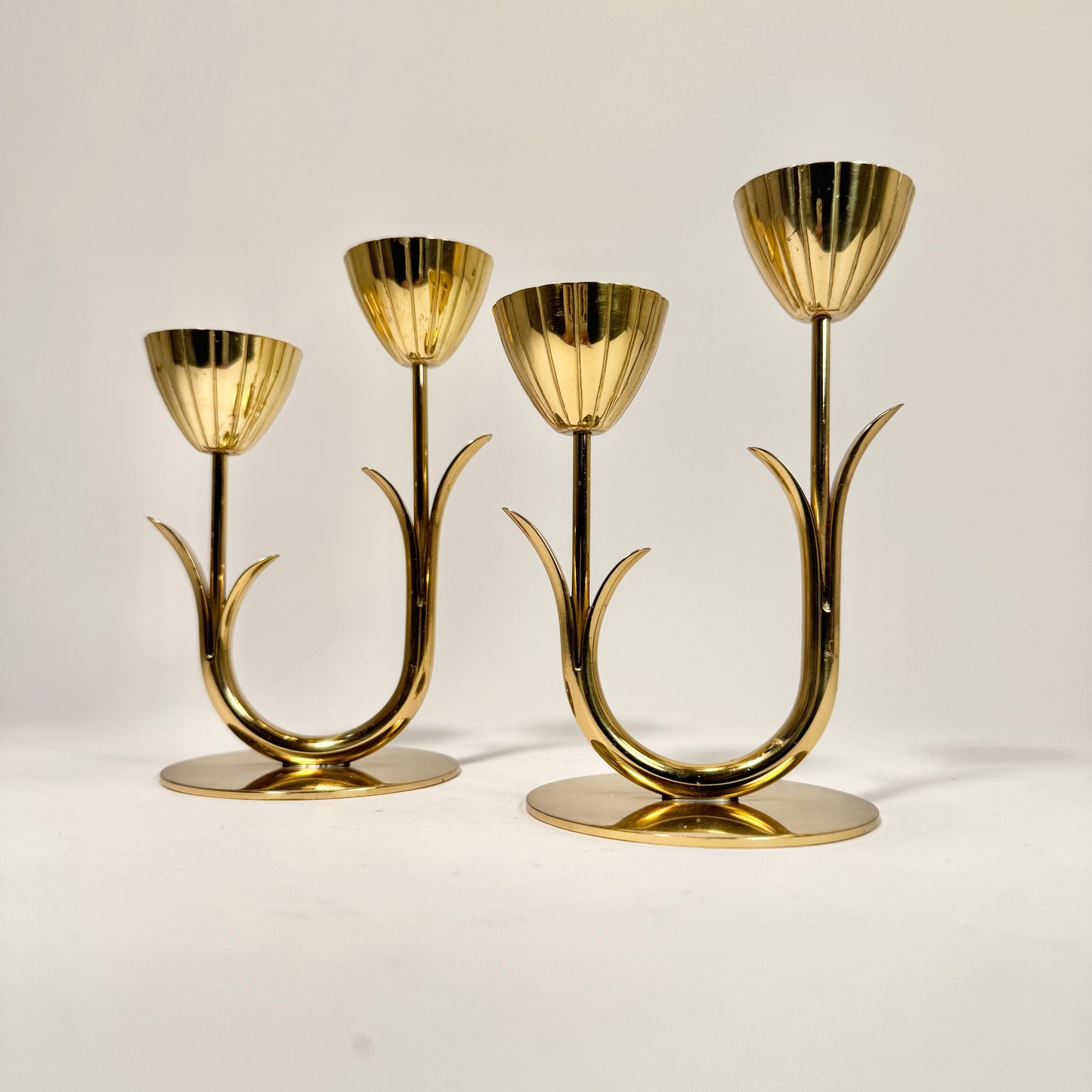 Ljusstakar i mässing av Gunnar Ander for Ystad Metall